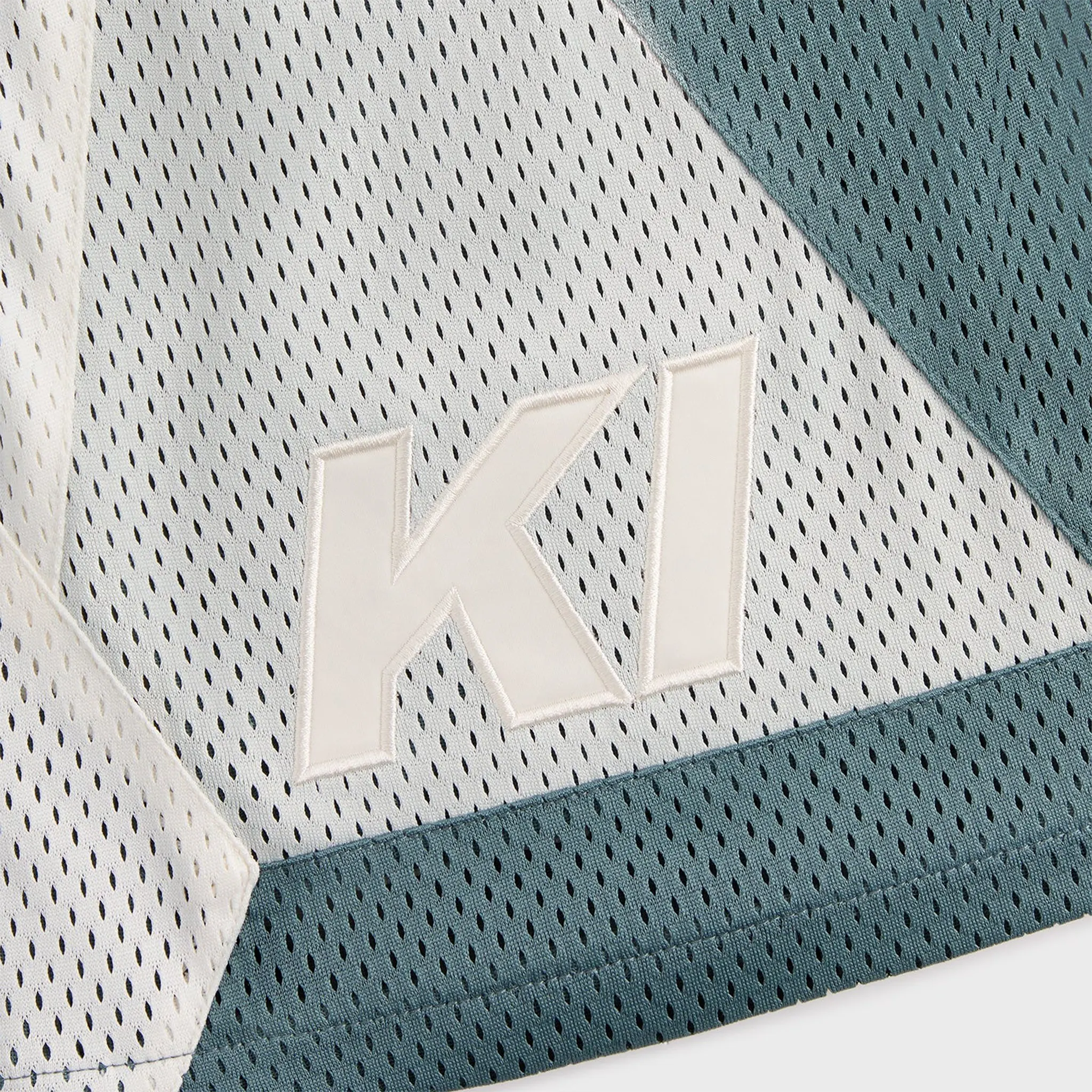 Close up view of Kith Mesh Turbo Shorts Wilde